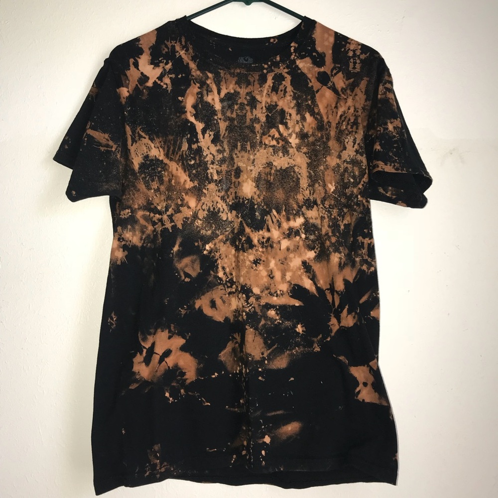 I am selling this black orange splattered shirt.